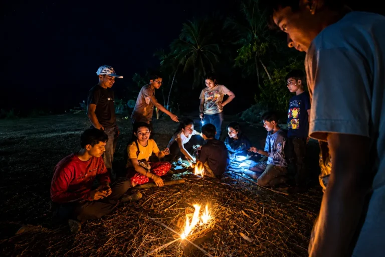 Children enjoying a campfire at Huppya camp